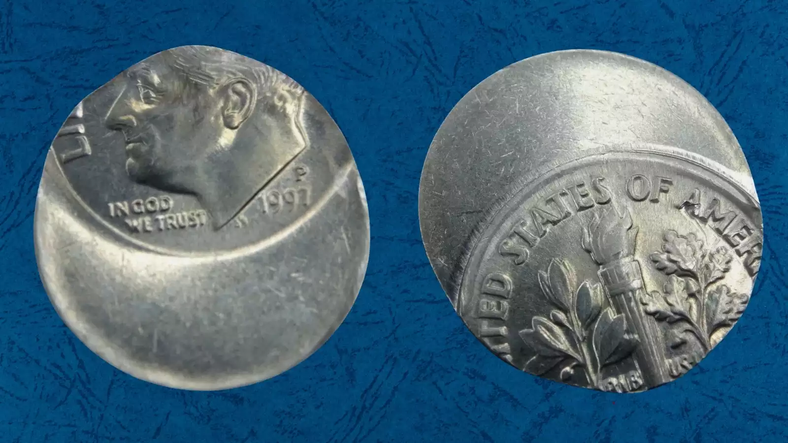 1997 dime off-center strike error showing design shifted approximately 40% from center