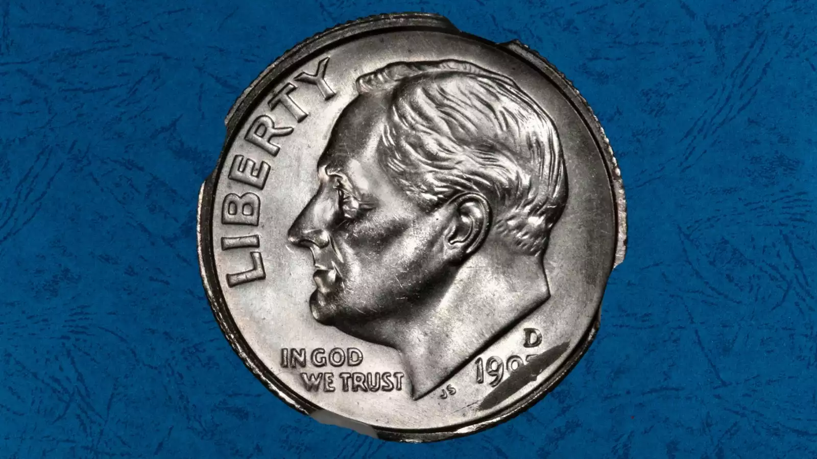 1997 dime clipped planchet error showing curved section of missing metal on edge