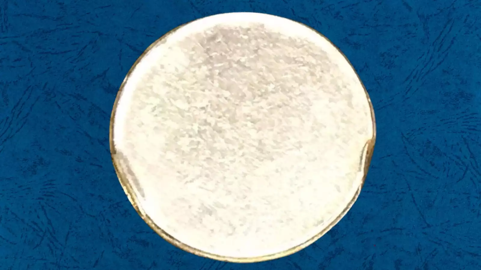 1997 dime blank planchet error showing unstruck copper-nickel clad blank next to normal struck dime
